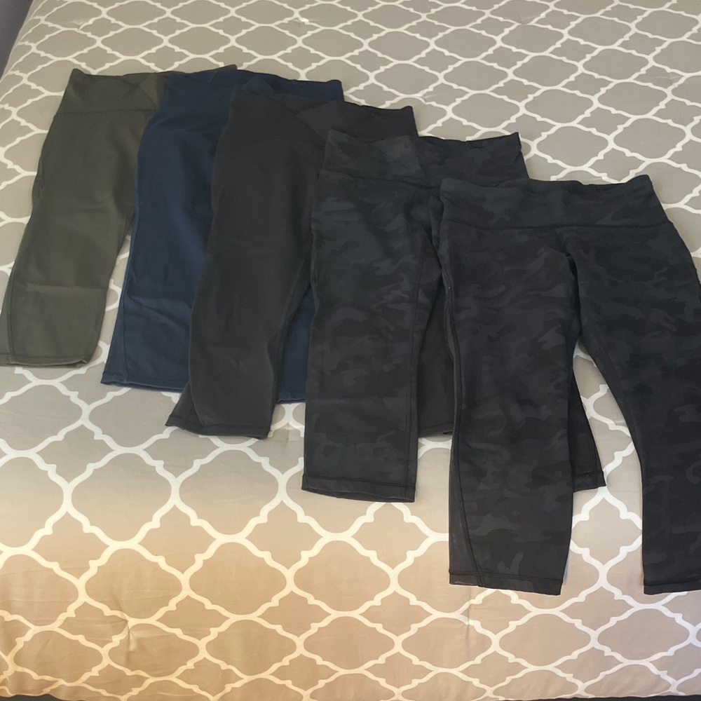 Lululemon Train Times 21” crop lot. Navy, olive, black, camo x2